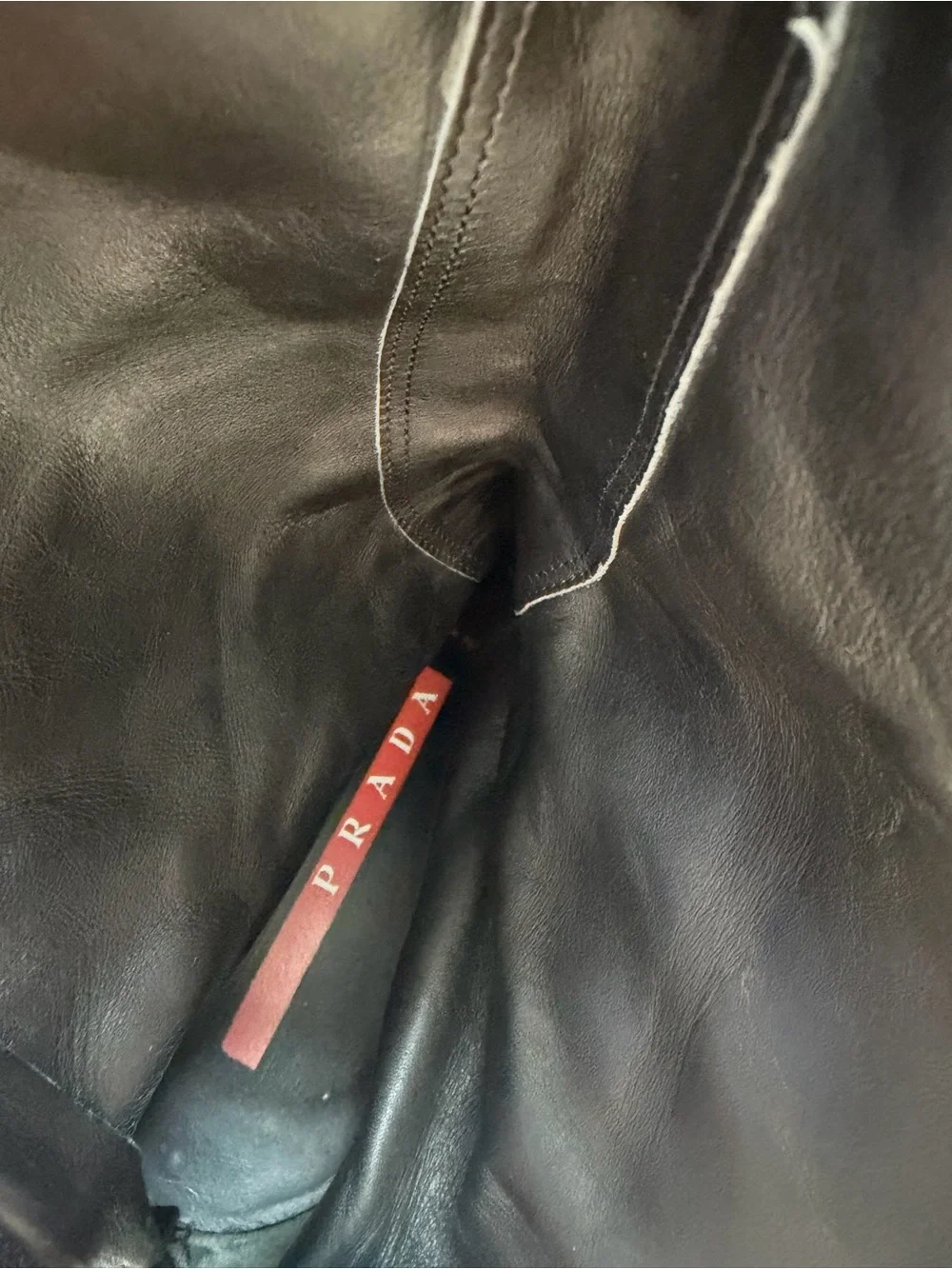 Prada Black Leather Over-The-Knee Boots with Red Heel Tab